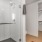 a bathroom with a shower and a closet