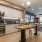a kitchen with a table and chairs
