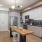 a kitchen with a table and chairs