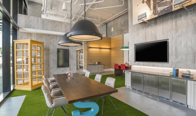 Cutting-edge amenities at your fingertips a room with a table and chairs