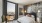 a bedroom with a large window