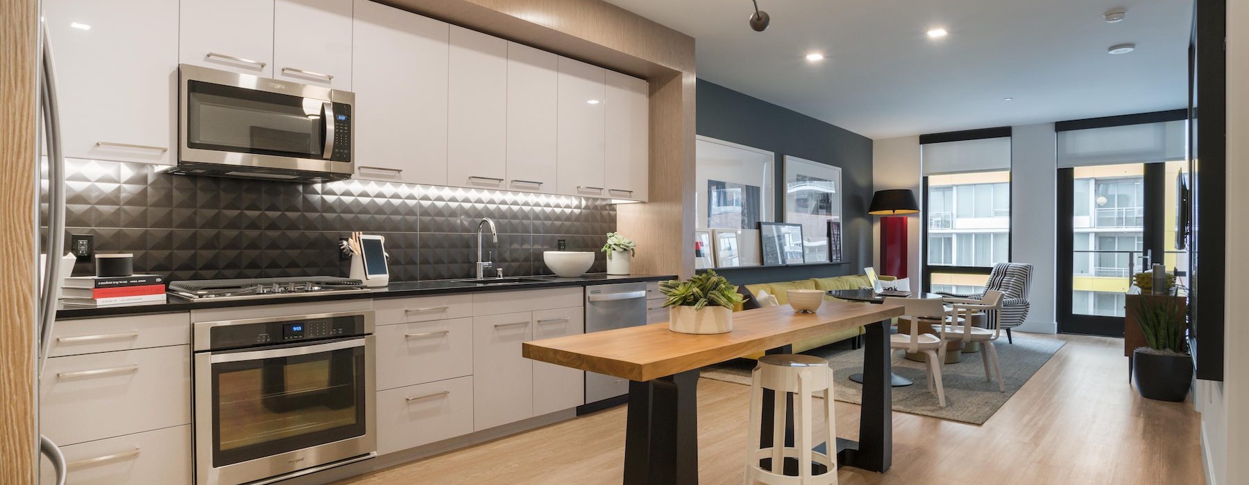 a kitchen with a table and chairs