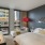 a bedroom with a large window